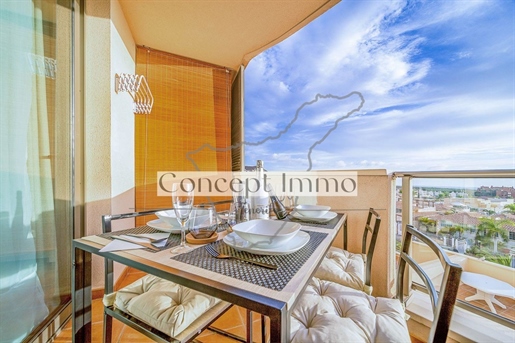 Modern and elegant furnished apartment with sea view balcony and heated swimming pool in Palm Mar!