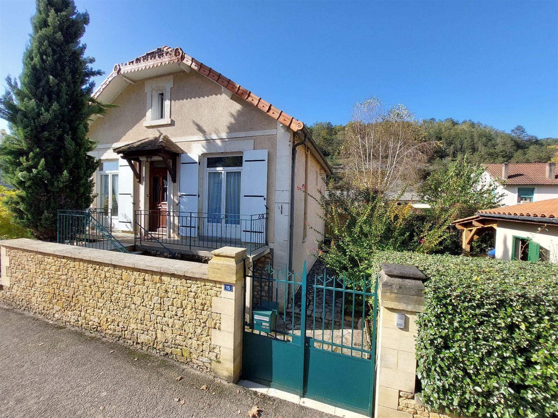 Village house with land and garage