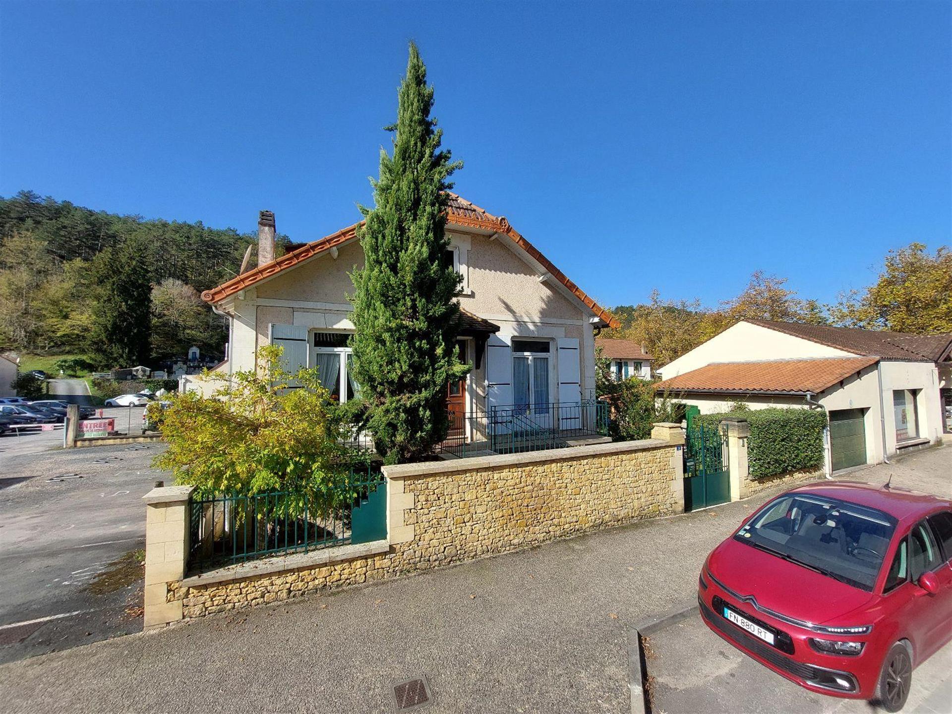 Village house with land and garage