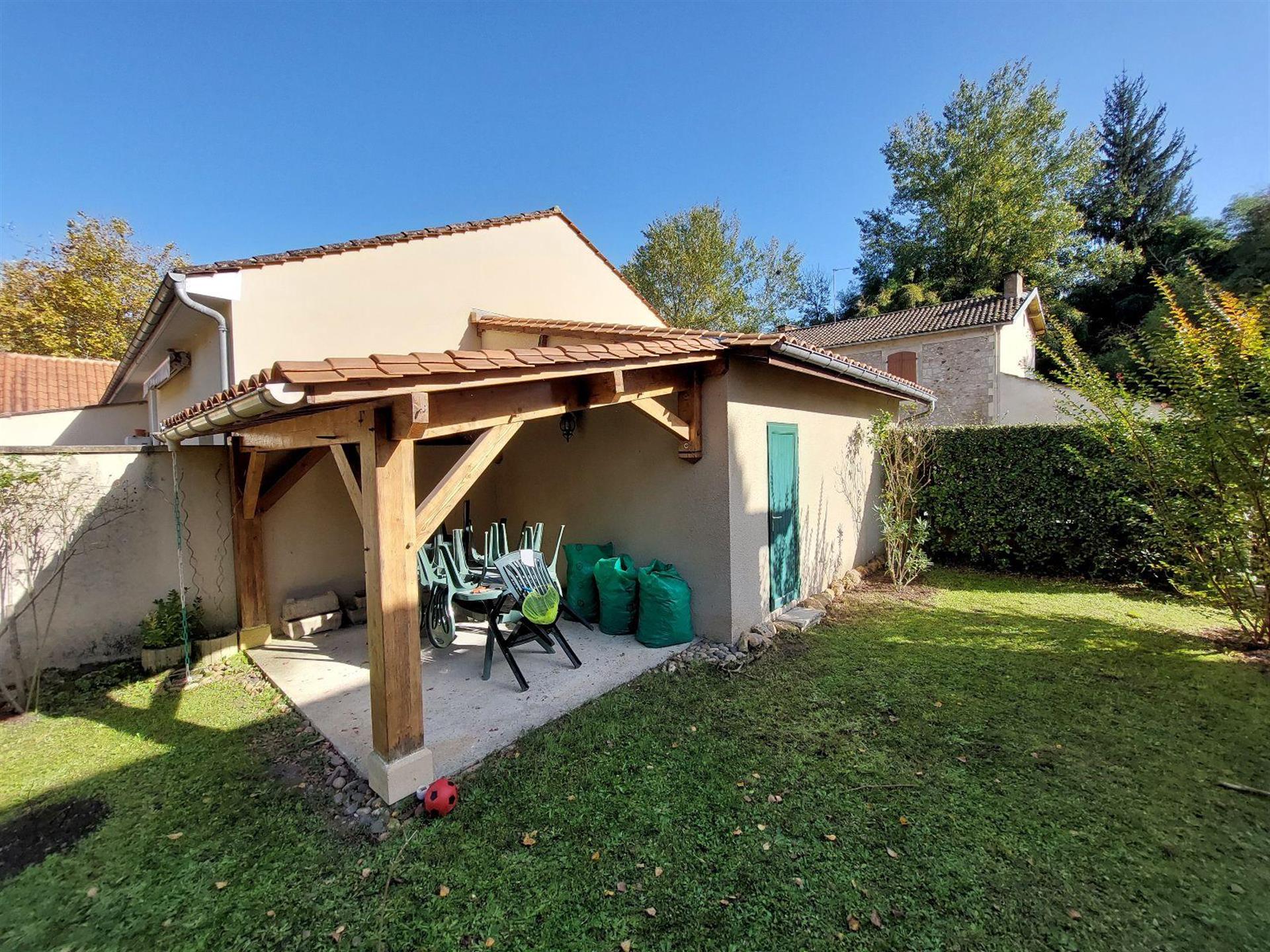 Village house with land and garage
