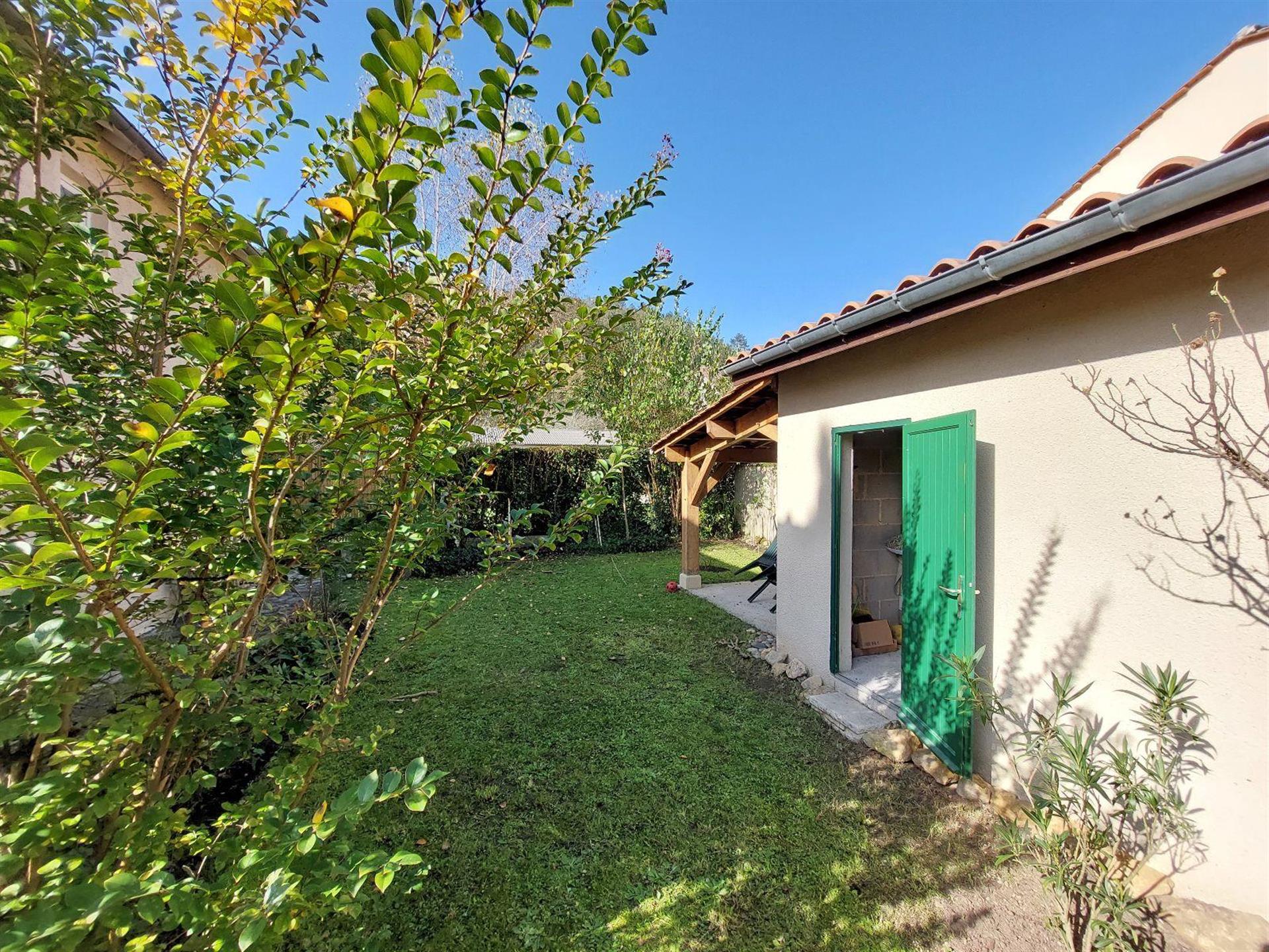 Village house with land and garage