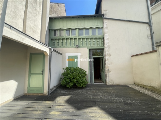 Verkoopt Karakteristiek huis met handelspand in Lignières