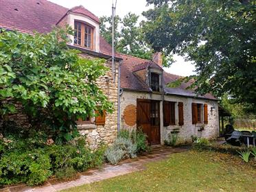 For sale in the Cher, central region, near Lignières, a renovated farmhouse with a large barn and