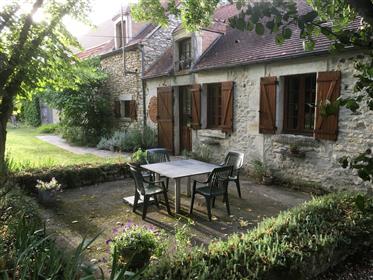For sale in the Cher, central region, near Lignières, a renovated farmhouse with a large barn and