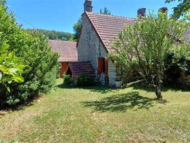 Limousin region, near Lupersat, a beautiful authentic stone house with a barn and a