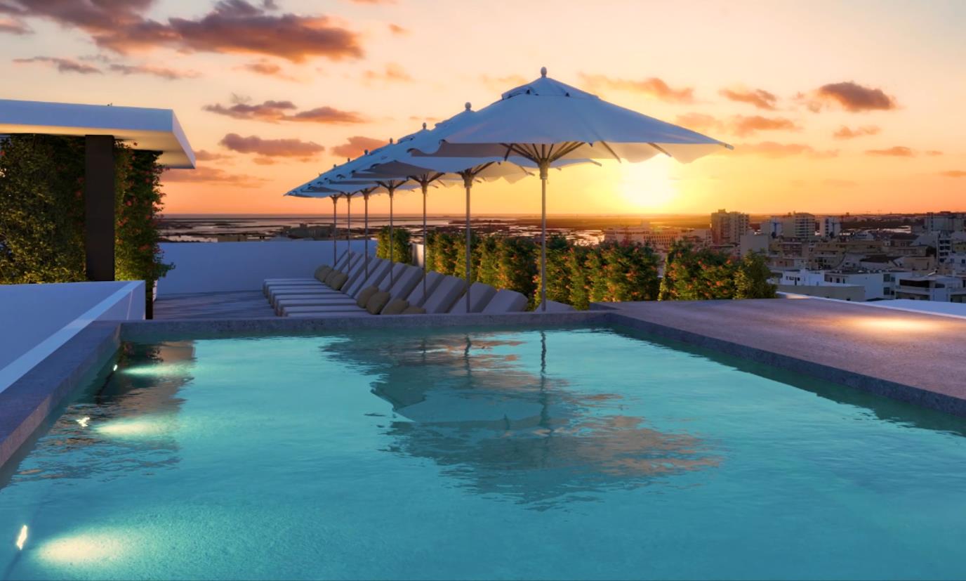 Magnifique appartement neuf - zone centrale de Faro, avec piscine et terrasse avec vue sur la mer