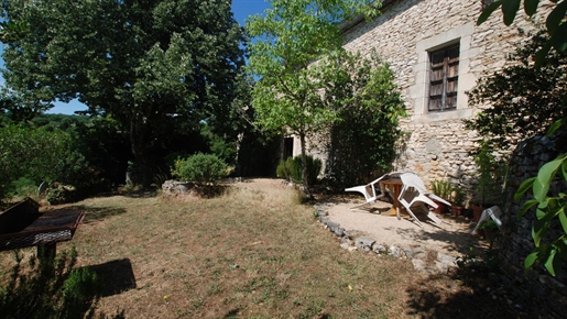 Dordogne Valley, restored barn with views over 4800 mÂ² of land.