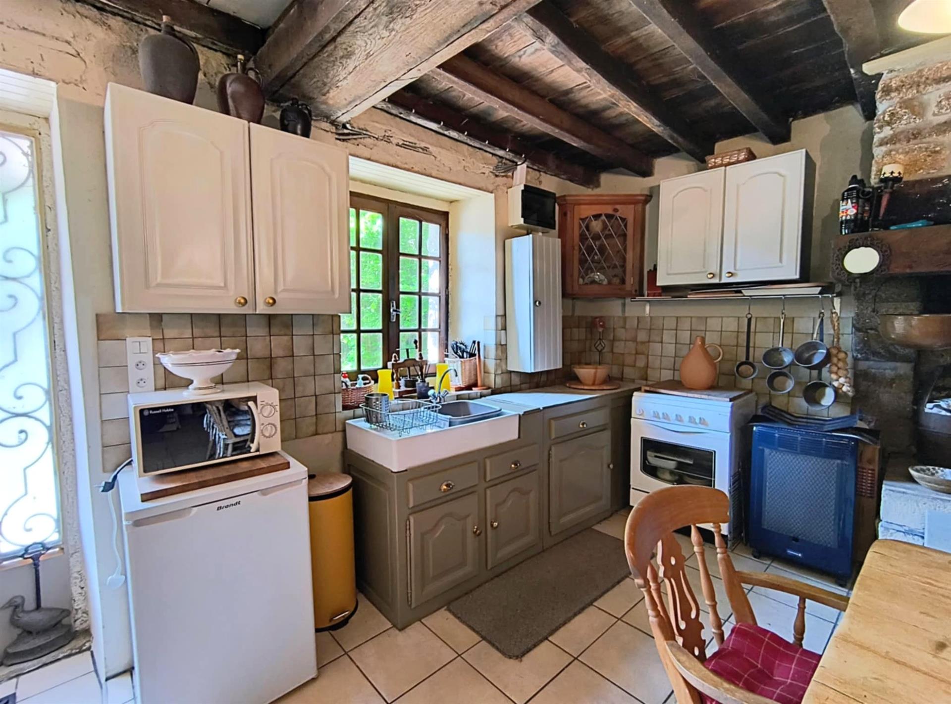 Detached character house with land and outbuildings in the countryside