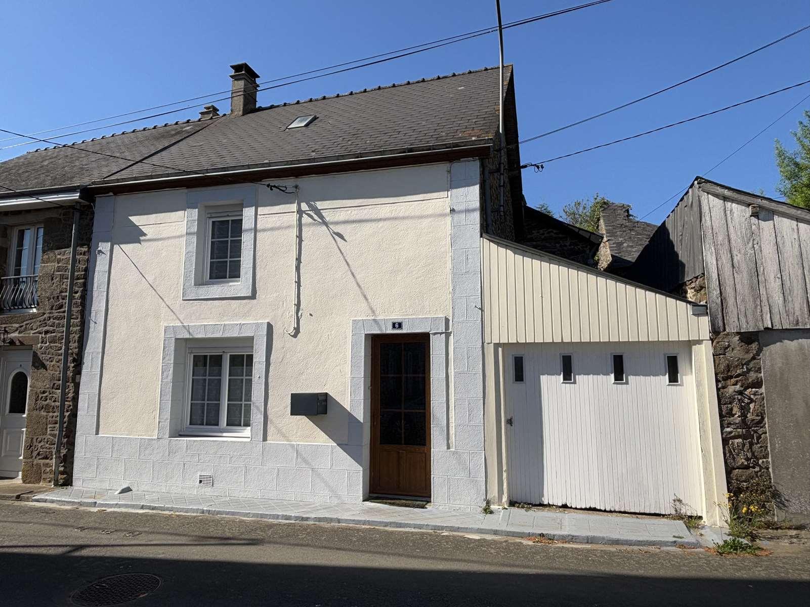 Village house with garden and garage