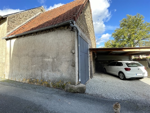 14 minutes from Gueret, detached house with car port and garden.