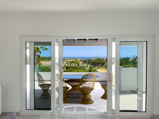 Villa with pool and sea view on the golf course