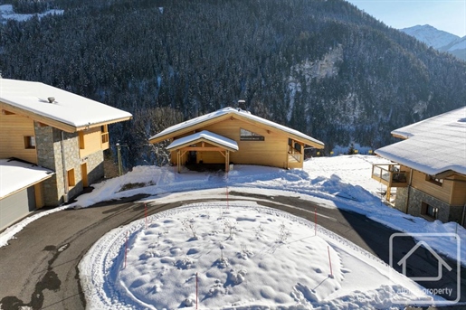 A stunning, modern chalet built to high specifications, in a sunny location with open views.