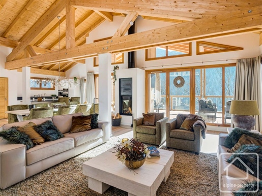 A stunning, modern chalet built to high specifications, in a sunny location with open views.