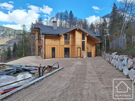 A 4 bedroom high-quality new build chalet sold with a partially-built development of 2 additional un