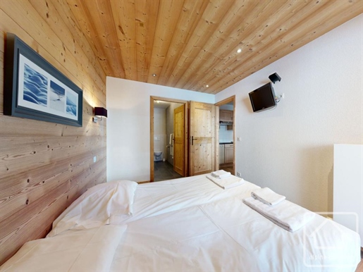 Appartement met 1 slaapkamer naast de skiliften met ondergrondse parkeergarage en gebruik van de