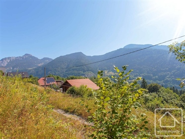 A sunny plot with fantastic views in a pretty and peaceful location. Sold with full planning permiss