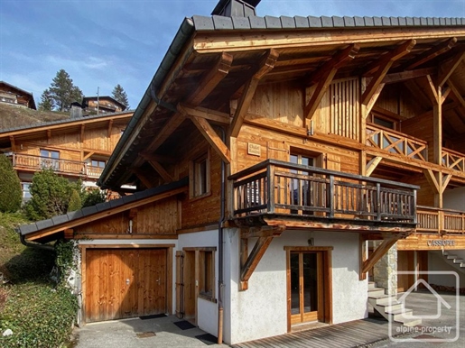 A captivating three-storey property overlooking the picturesque historic mountain village of Samoëns