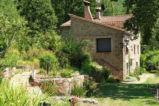 In Saint-Laurent-De-Cerdans, character farmhouse with outbuildings for sale