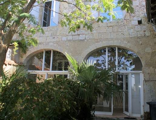 Centre of Lectoure, old building with adjoining garden