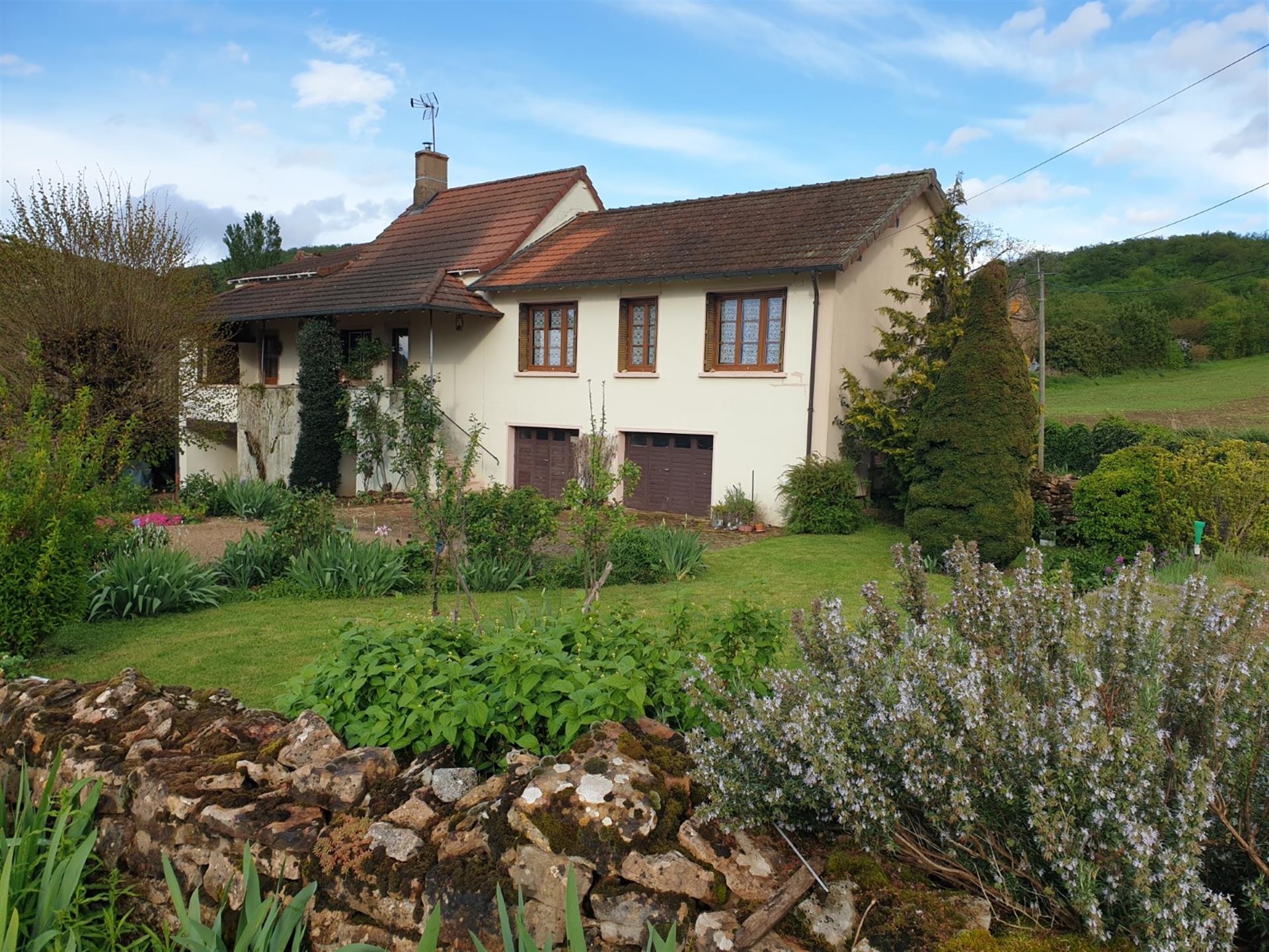 Beautiful location on the outskirts of the village. Old house with small garden.