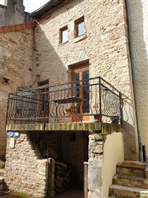 Heart of Bourg with shops. Large townhouse with separate garden 2km away.