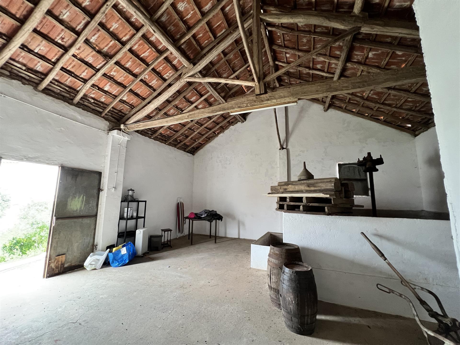 Rustic house with surrounding land and local accommodation license