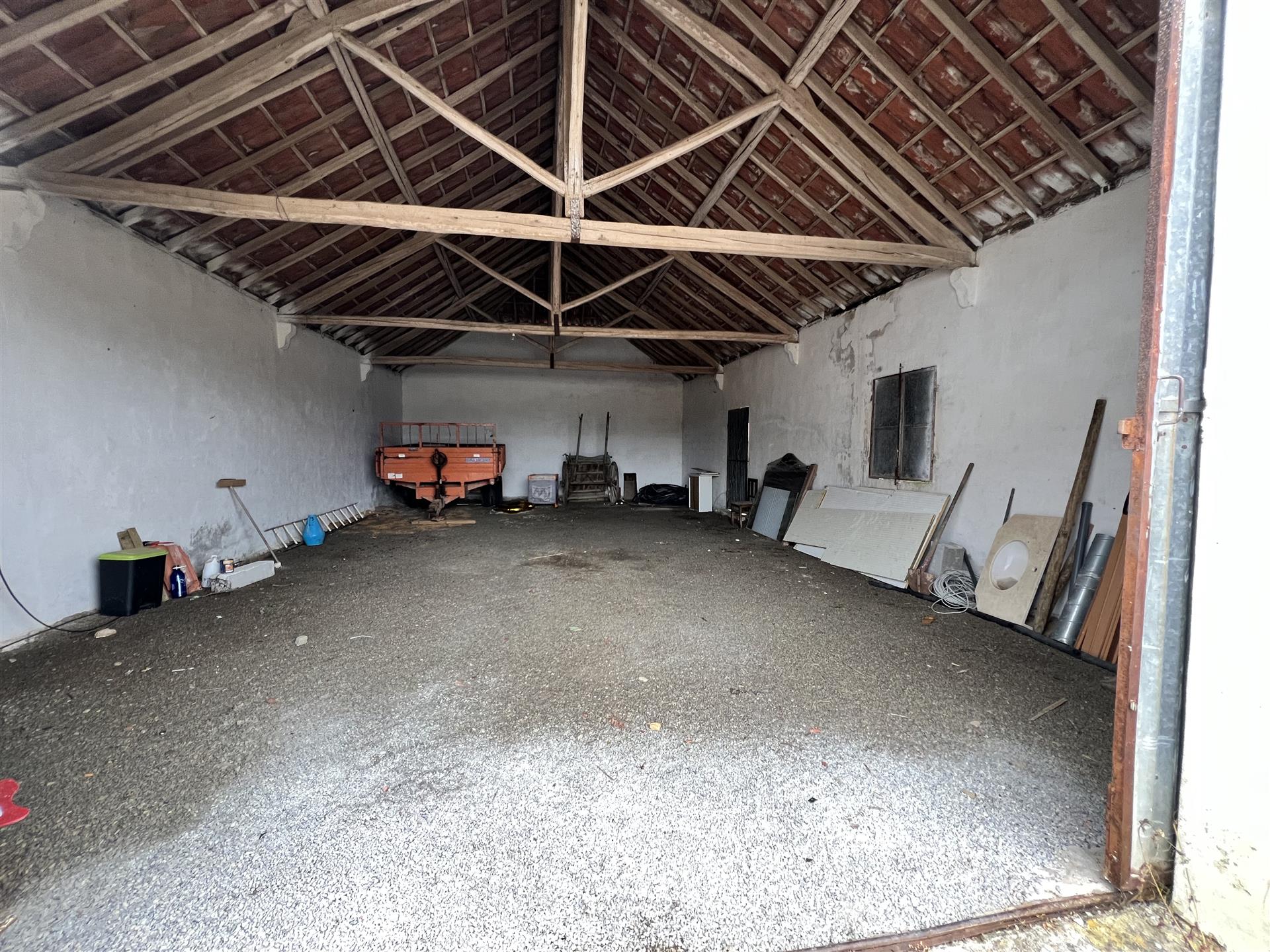 Rustic house with surrounding land and local accommodation license