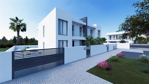 Elegant 4 bedroom single-sided semi-detached villa with pool in Algoz in the "Sorrisa o Sol" develop