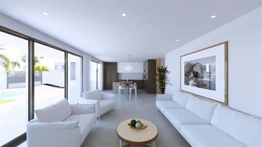 Elegant 4 bedroom single-sided semi-detached villa with pool in Algoz in the "Sorrisa o Sol" develop