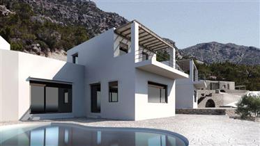 Three semi-finished maisonettes sold completed/finished on a plot of 1.500m2. 