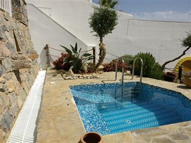 A lovely villa of 112m2 on a plot of 4000m2 with stunning mountains and sea views.
