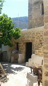 Traditional stone house with beautiful original features for sale in Zou. 