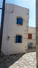 Traditional stone maisonette house with small courtyard in Armeni.