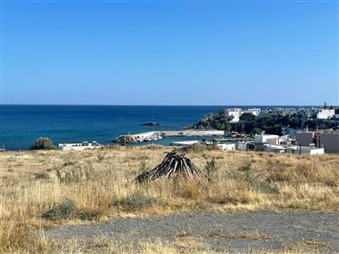 Unique plot with stunning sea views overlooking amphitheatrically all of Makry Gialos harbor. 