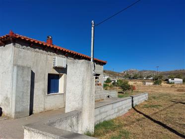 House with large plot enjoying mountain and village views in  Chandras, Sitia, East Crete.