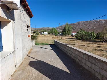 House with large plot enjoying mountain and village views in  Chandras, Sitia, East Crete.