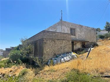 Agios Stefanos – Makrigialos  Two storey house for renovation located 7km from the sea and from Makr