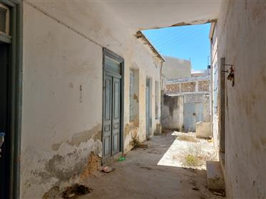 Two stone houses with courtyard just 270meters from the sea in Sitia , East Crete.