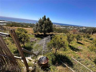Agricultural plot of land enjoying fantastic sea views just 1km from the sea in Makry Gialos, South 