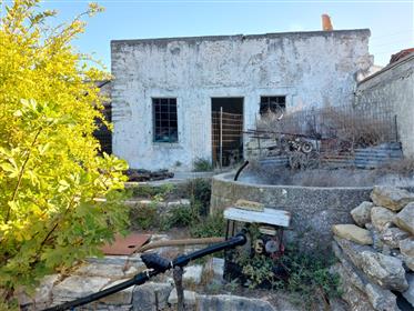 Traditional stone house with garden with mountain and sea views in Armenoi, Sitia, East Crete.