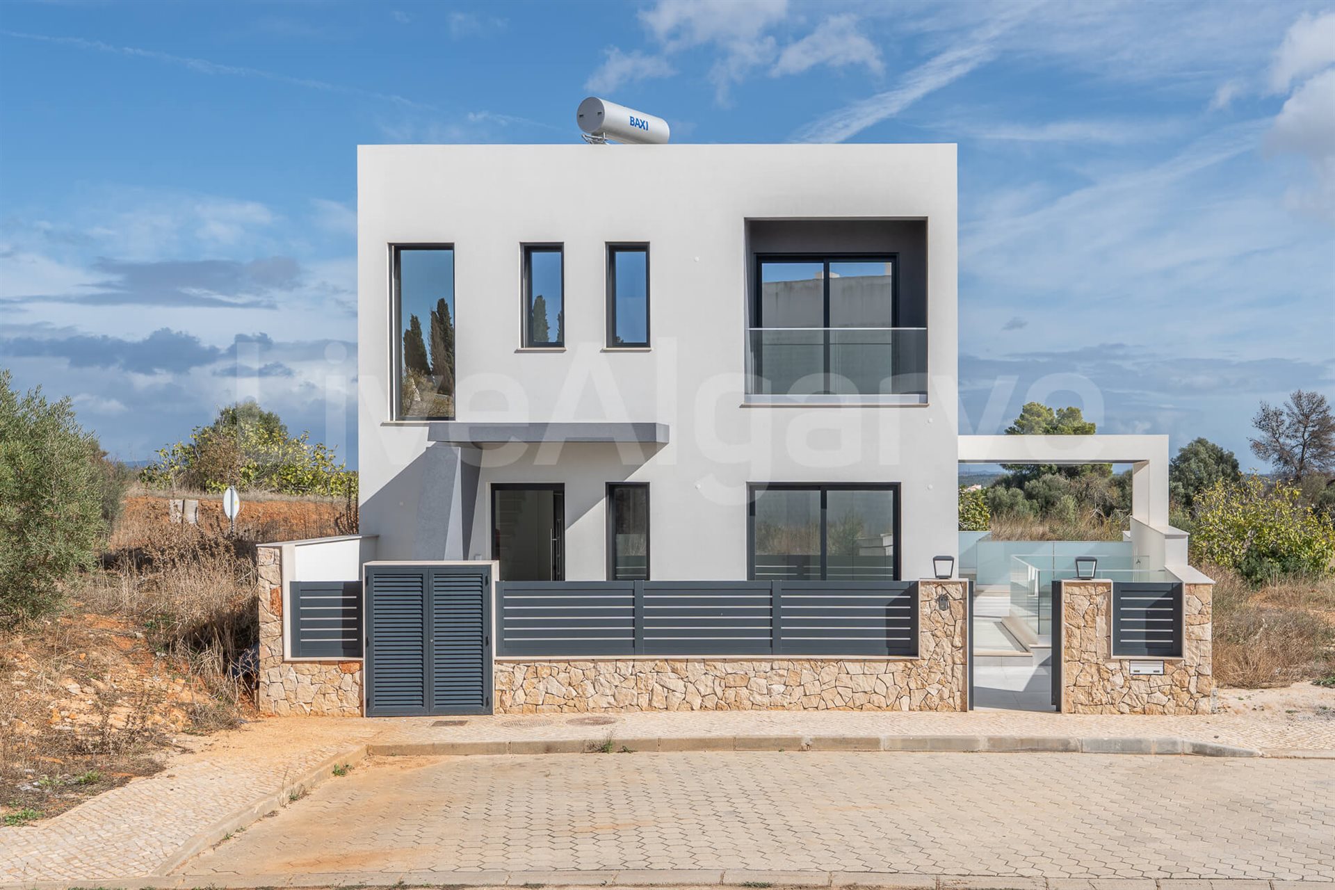 Kansen | Nieuwe ultramoderne T3+1 Villa te koop in Mexilhoeira Grande - Portimão