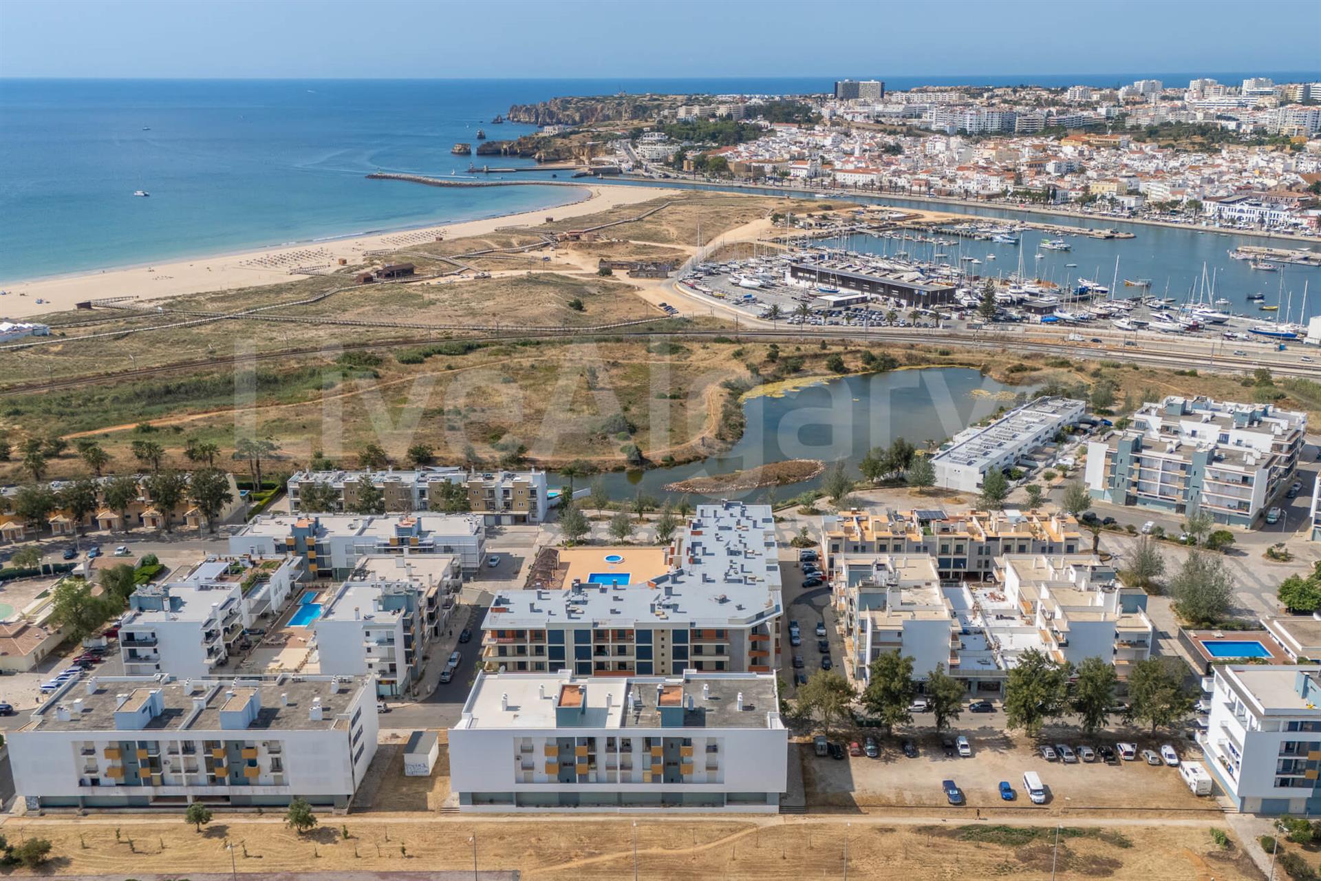 Luxury | T4 Penthouse with Panoramic Sea and City Views at Meia Praia for Sale – Lagos