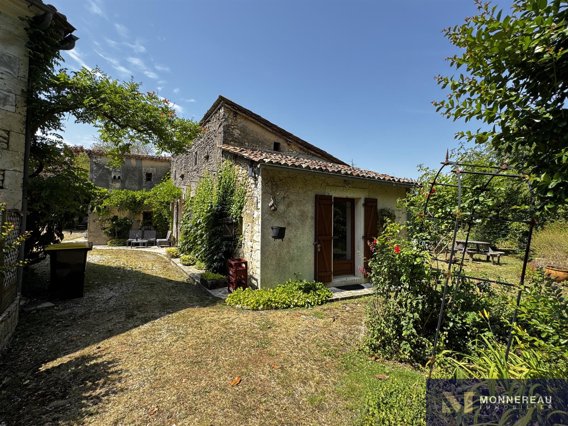 Property Of Three Dwellings With Outbuildings