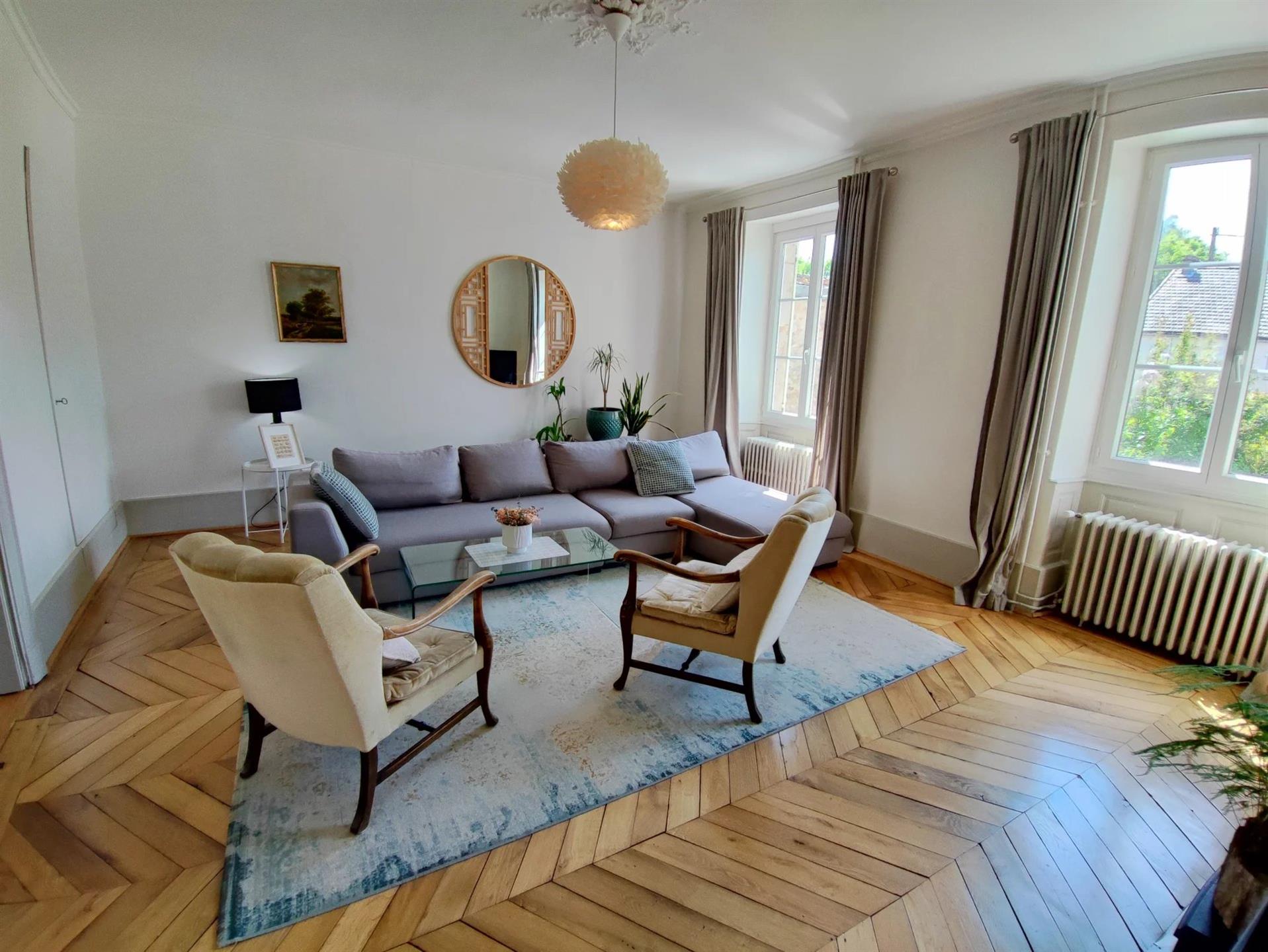 Authentic townhouse with garden and gites.