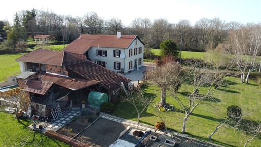 Big renovated house with outbuildings and pond on 1Ha