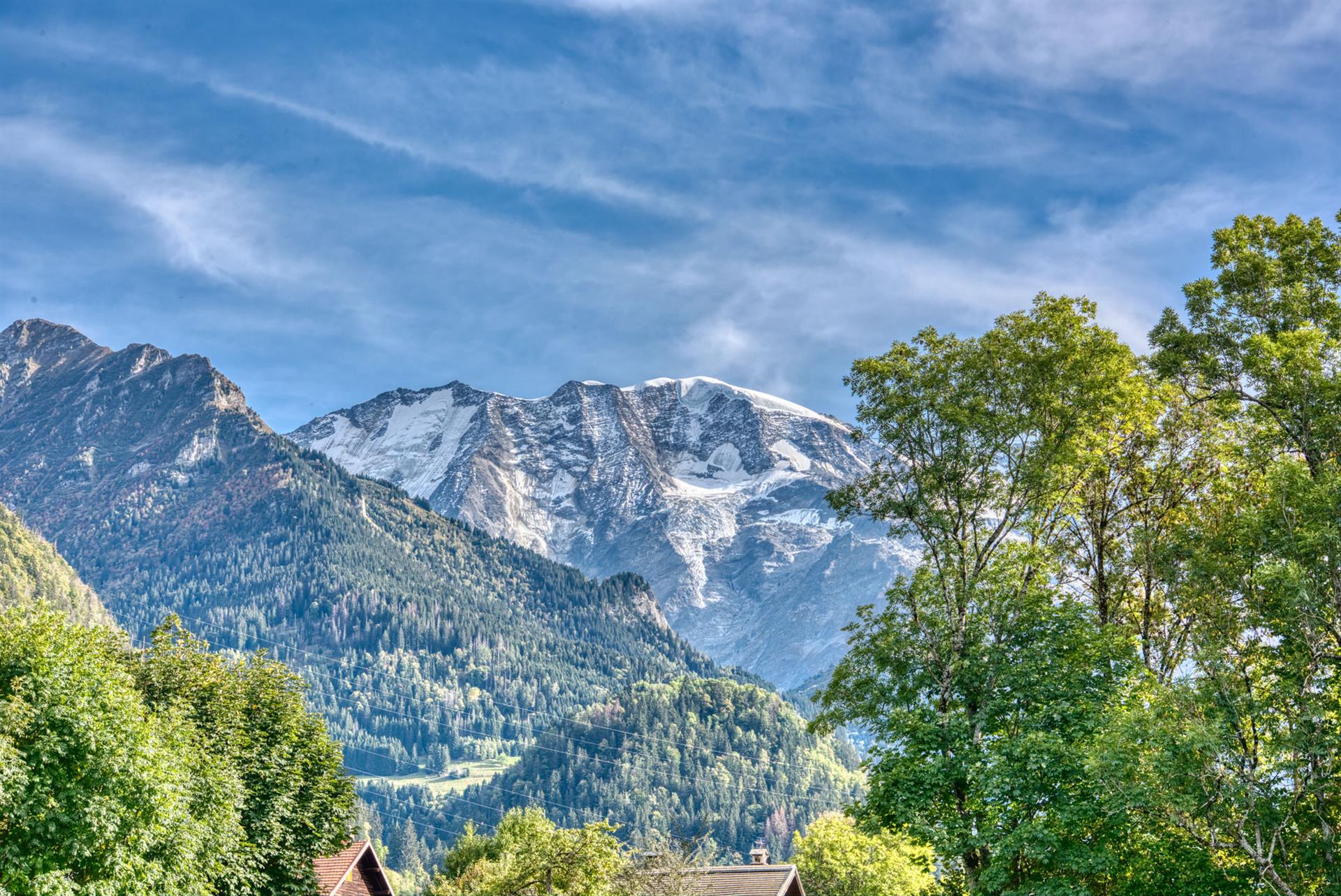 Land at the foot of the village