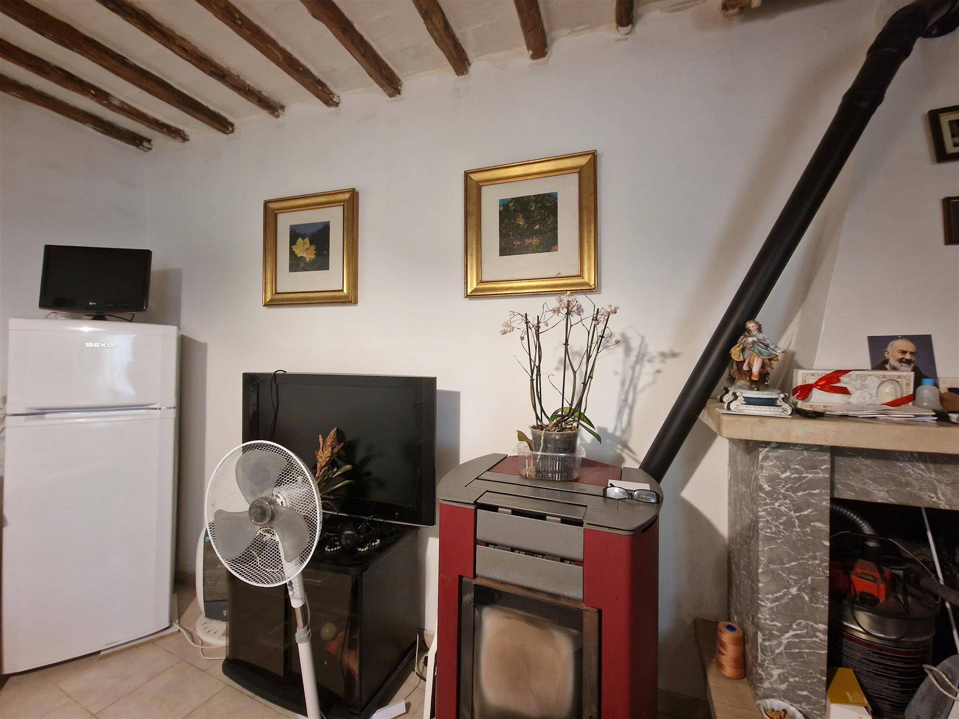 Two-room apartment in stone with fireplace