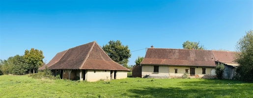 Semi-detached farmhouse consisting of 2 dwellings