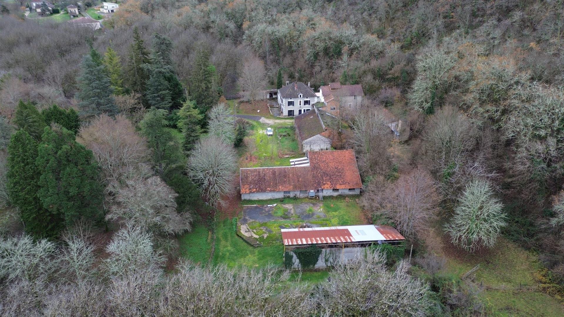  Lot Old mill house with outbuildings and over 7 hectares of land and woods