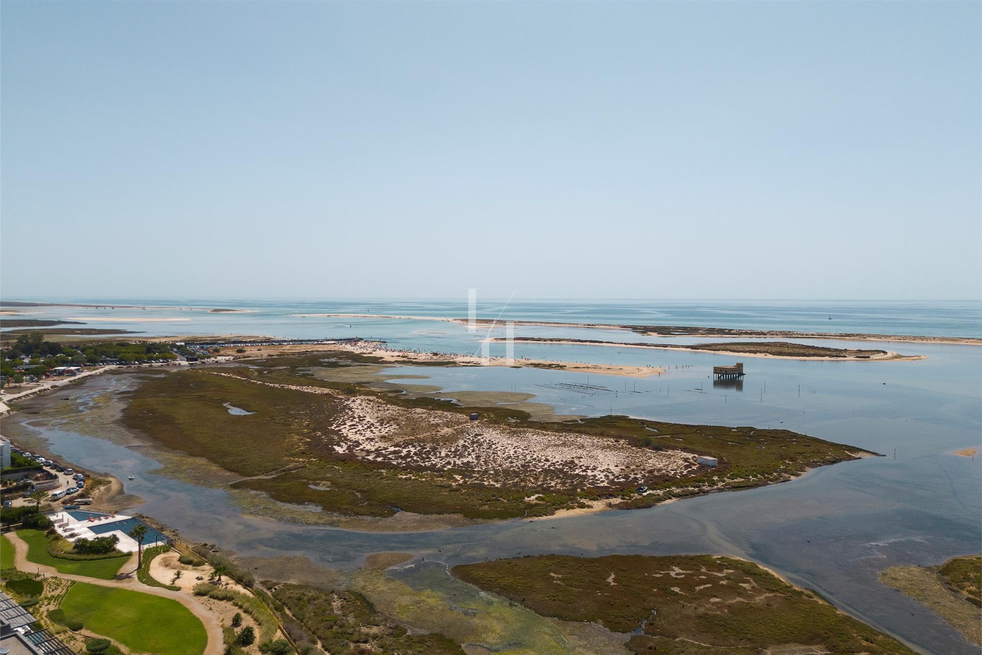 3 bedroom semi-detached villa with pool and views of the sea and Ria Formosa